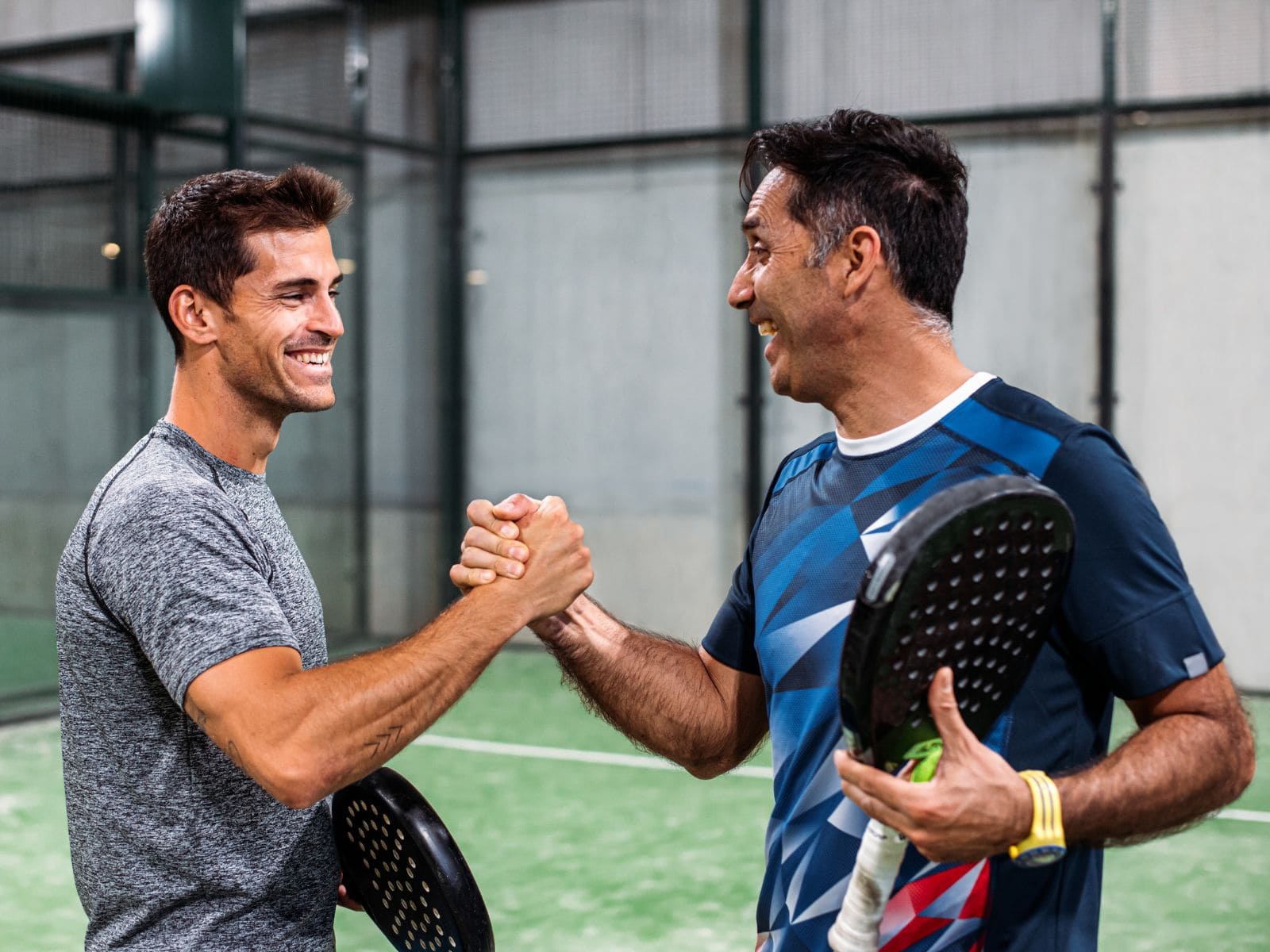 Padel players and coaches on court