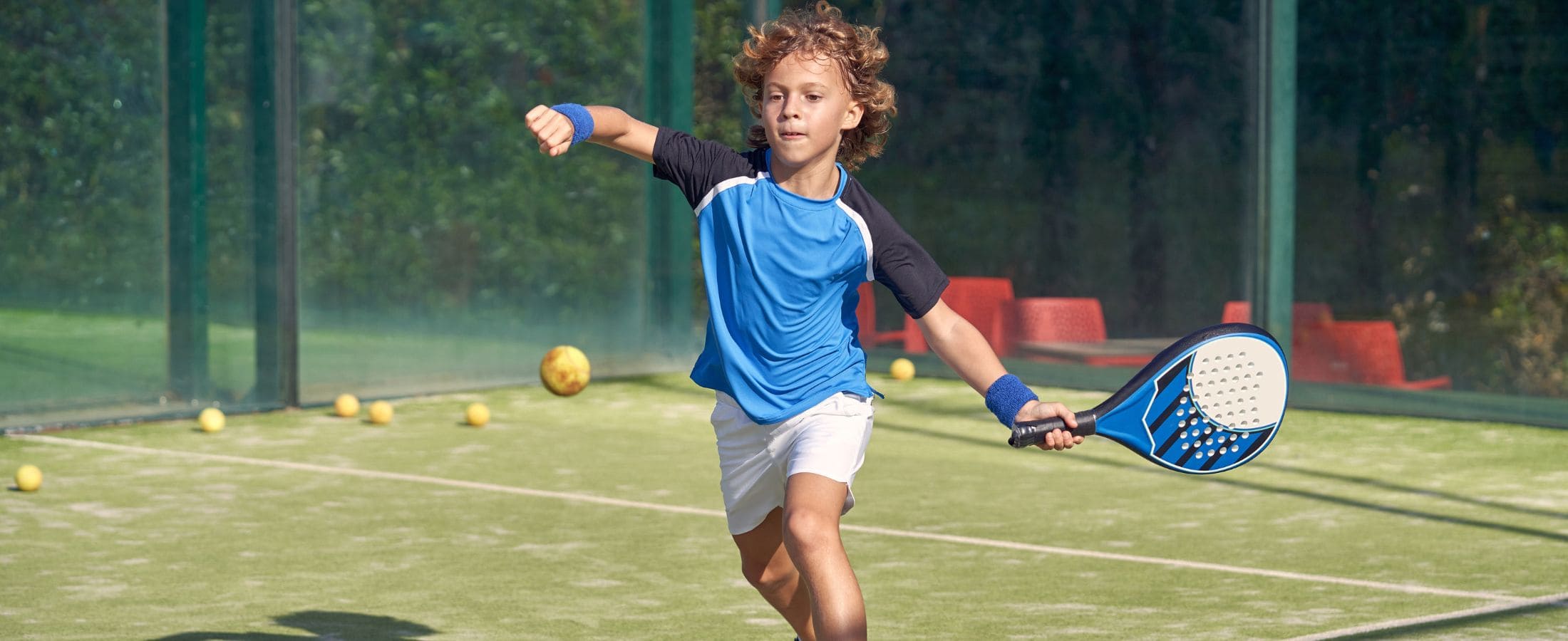 School group playing padel